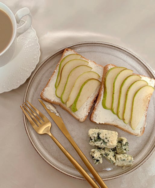 Close-Up Shot of Toasts with Pear on Top